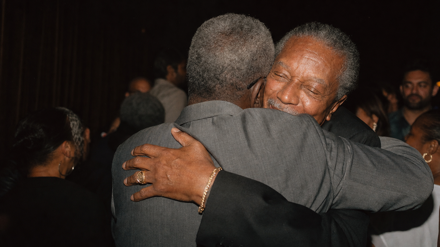 Friends embracing at a celebration